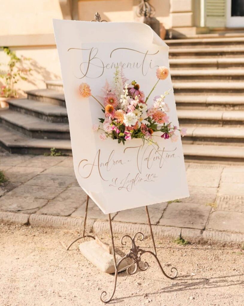 Wedding welcome sign with floral decorations